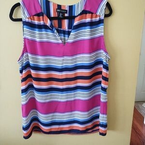 Jones New York blouse size L, V neck collar, multicolored fuchsia, black.